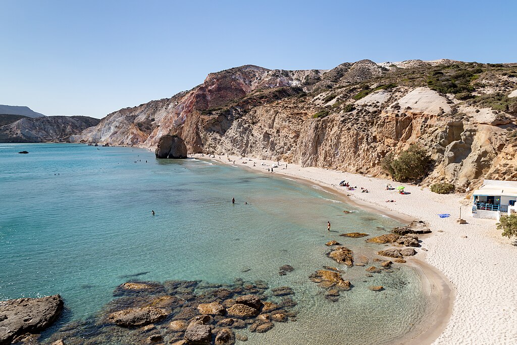 Firiplaka Beach in Milos, featuring a mixed shoreline with moderate water conditions