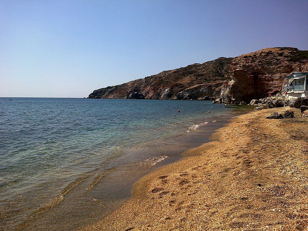 Paleochori Beach in Milos, featuring a mixed shoreline with calm water conditions