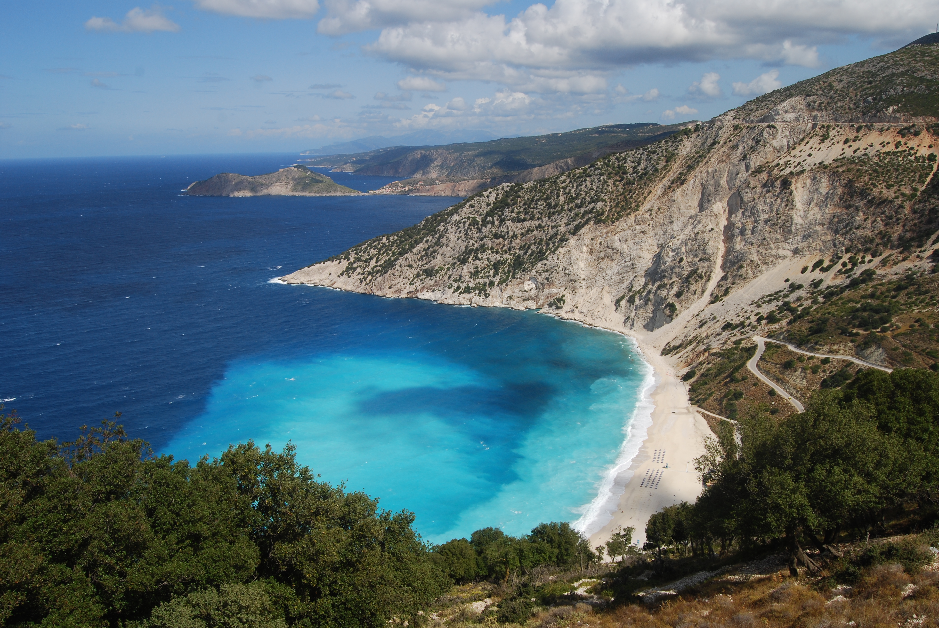 Myrtos Beach in Kefalonia, featuring a mixed shoreline with moderate water conditions