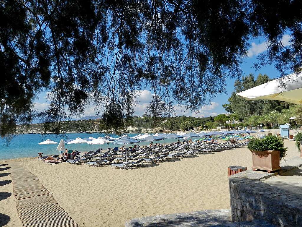 Marathi Beach in Crete, featuring a sandy shoreline with calm water conditions