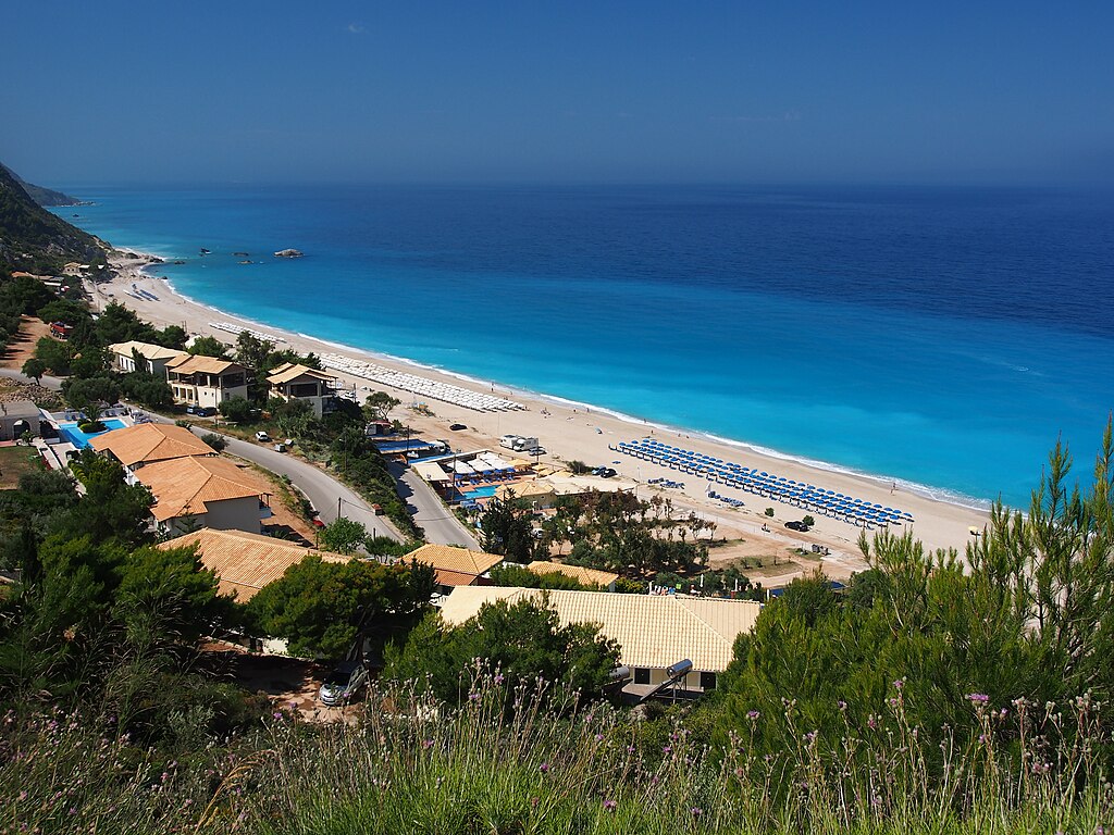 Kathisma Beach in Lefkada, featuring a mixed shoreline with moderate water conditions