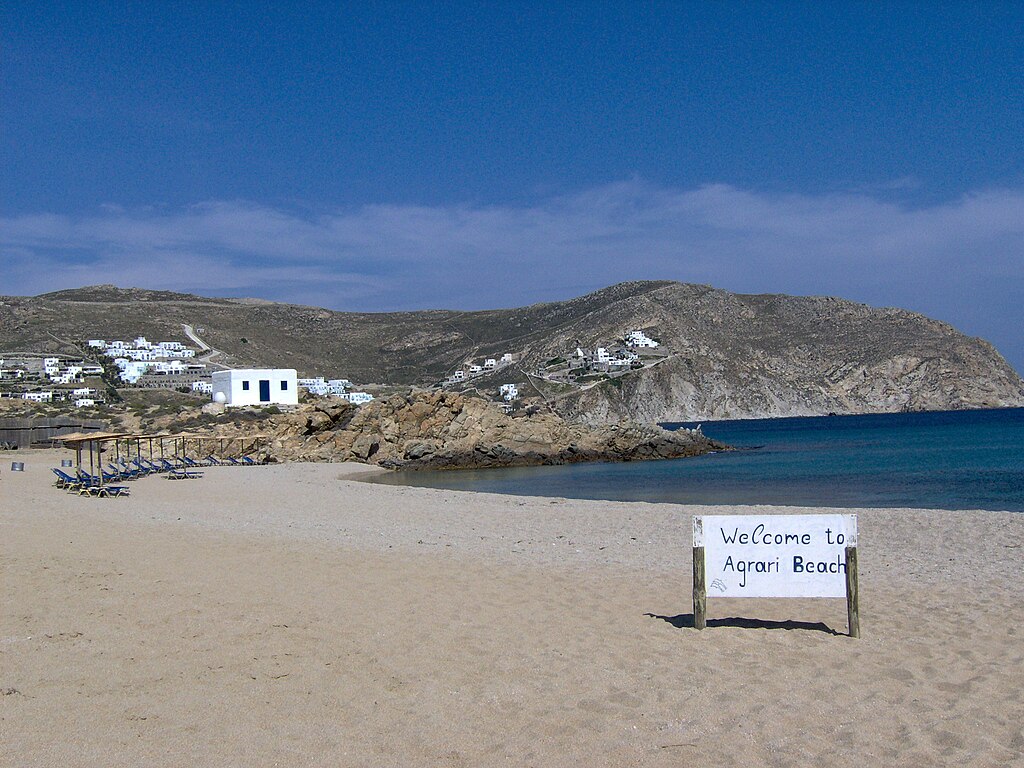 Agrari Beach in Mykonos, featuring a mixed shoreline with calm water conditions