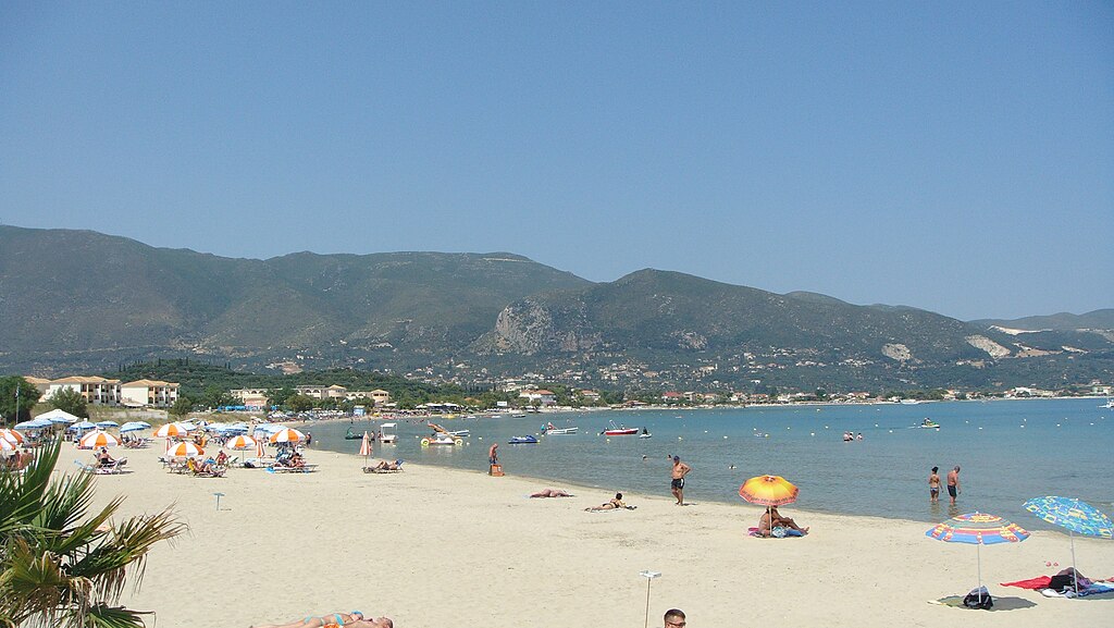 Alykes Beach in Zakynthos, featuring a mixed shoreline with calm water conditions, certified with Blue Flag status for environmental quality