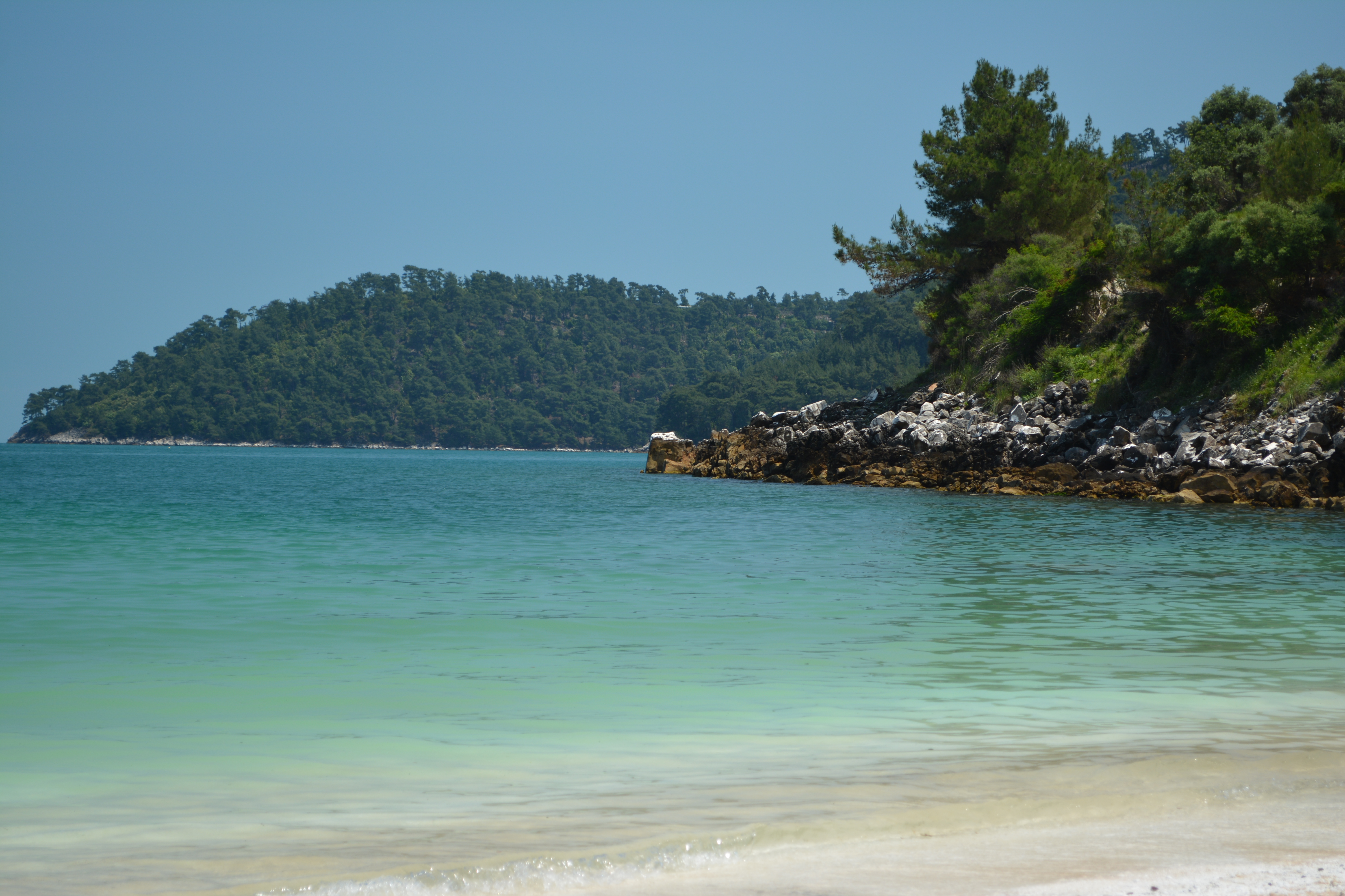 Saliara - Marble Beach in Thassos, featuring a pebbly shoreline with moderate water conditions